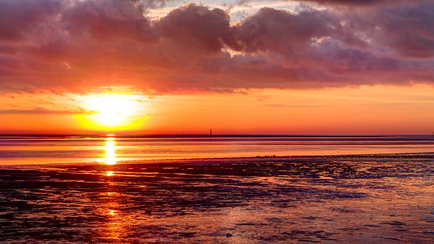 Lytham Sunset A view of the Ribble Estuary at sunset lytham st. annes stock pictures, royalty-free photos & images