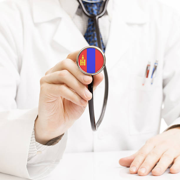 istock Doctor holding stethoscope with flag series - Mongolia 465363894