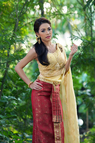 istock Thai woman wearing typical dress 465365119