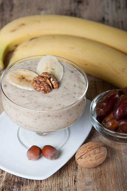 istock Smoothie with a banana with dates and nuts  . 465366580