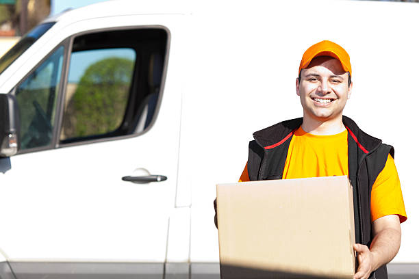 istock Young delivery man portrait 465366861