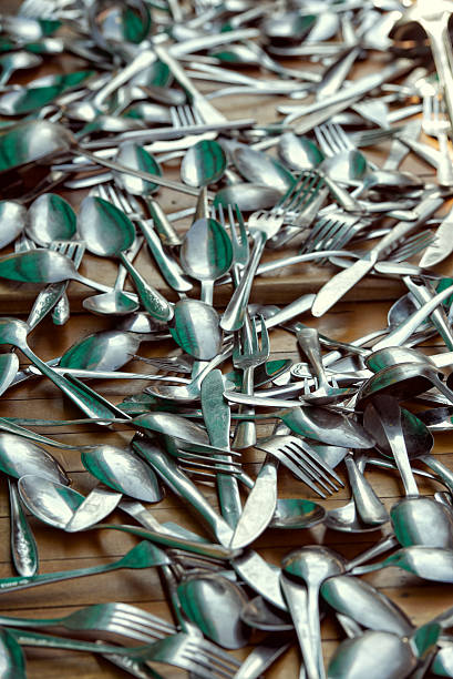 istock Heap of spoons, forks and knives 465367294
