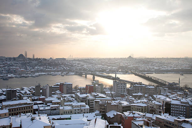 snowy day in Istanbul, Turkey. View from Galata Tower towards Suleymaniye in Istanbul on a snowy day golden horn istanbul photos stock pictures, royalty-free photos & images