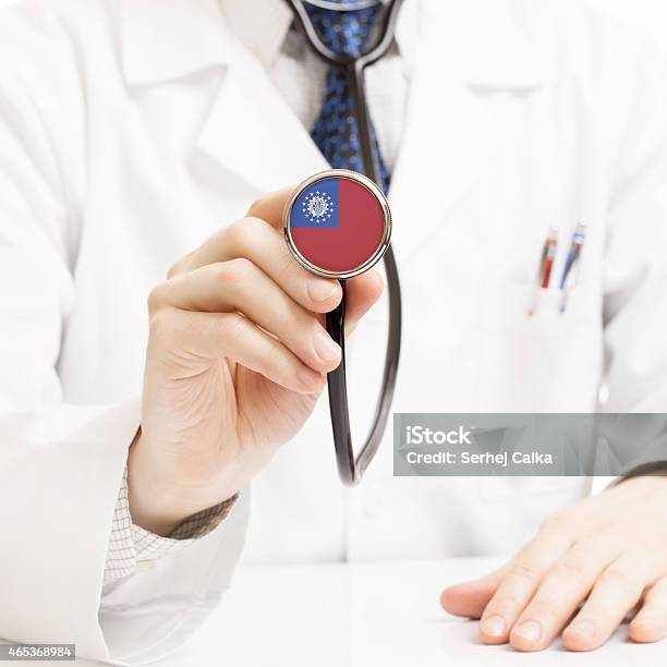 Doctor Holding Stethoscope With Flag Series Myanmar Burma Stock Photo - Download Image Now