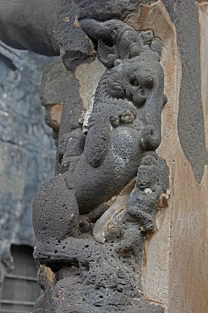 istock Mythological Lion faced animal with elephantine trunk sculpture 465369044