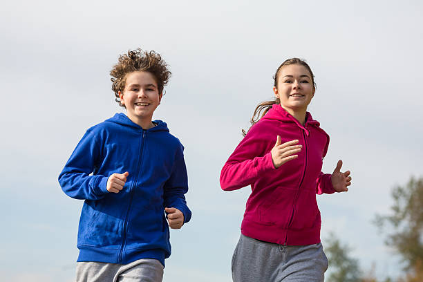 istock Young people running outdoor 465372860