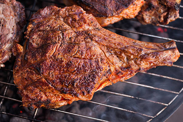 istock big beef steak with bone  on grill 465373024