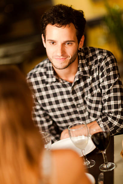 istock Happy young man in a restaurant 465373084
