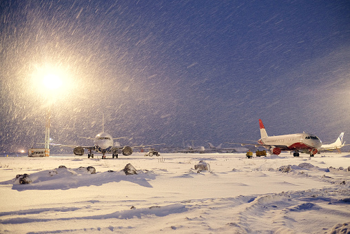 Moscow, Russia, February, 09,2015: commercial airplanes parking at the airport in winter