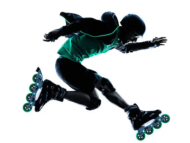one caucasian man Roller Skater inline  Roller Blading in silhouette isolated on white background