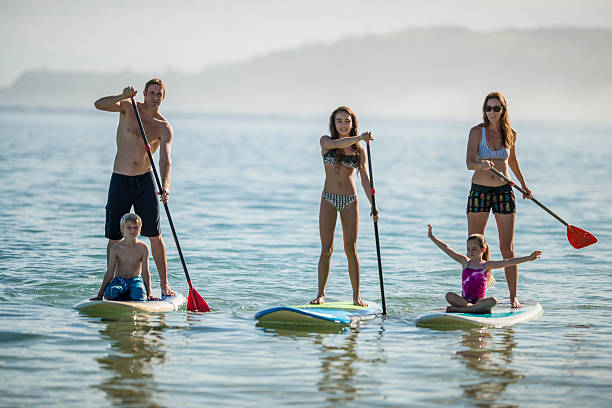 istock Family paddleboarding in Hawaii 465376450
