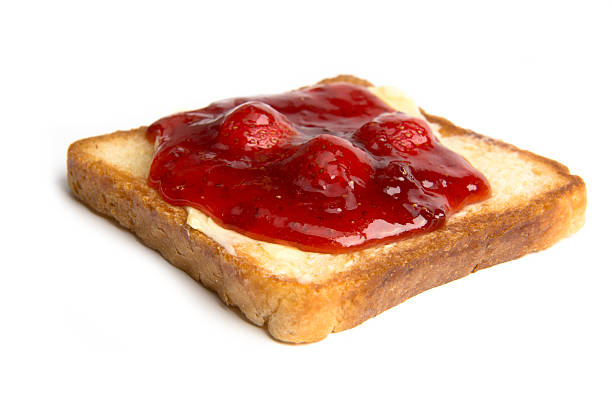 istock toast with butter and strawberry jam 465376804