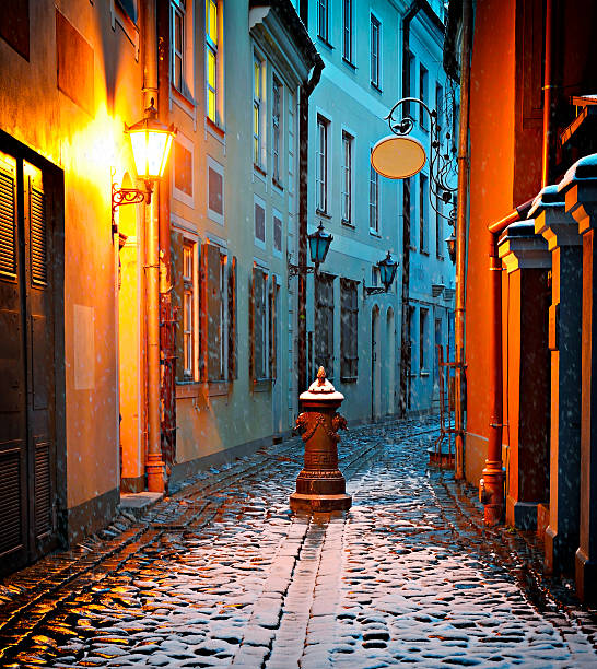 istock Narrow medieval street in winter, Riga 465380068