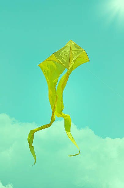 istock Yellow flying kite on the sky. 465380658