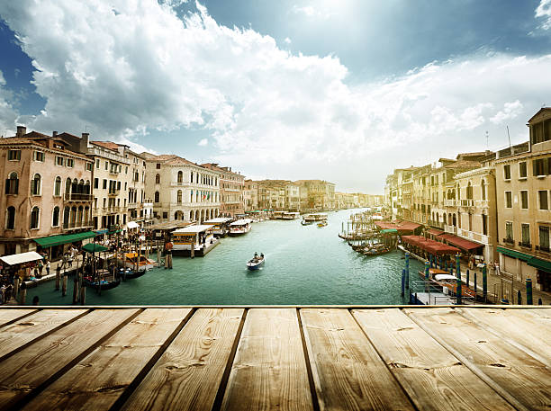 istock Venice, Italy and wooden surface 465382096