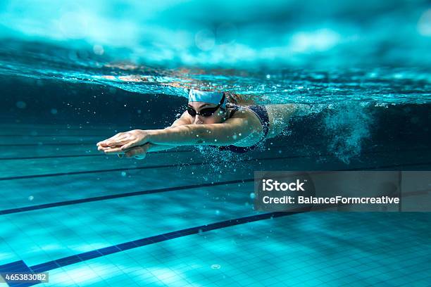 Female Swimmer At The Swimming Pool Stock Photo - Download Image Now - Swimming, Sport, Swimming Pool