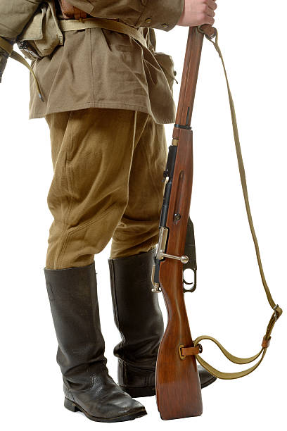 istock gun of a Soviet soldier during World War II 465386066