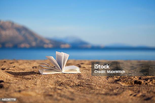 Book On A Beach Stock Photo - Download Image Now - Book, Beach, Wind