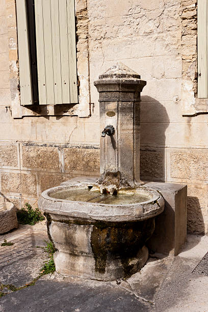 istock Old stone public fountain 465387920
