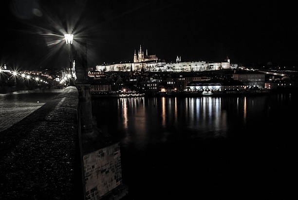 istock Prague Castle with Charles bridge in the night 465388302