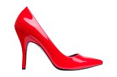 A bright red high heel woman's shoe by itself 