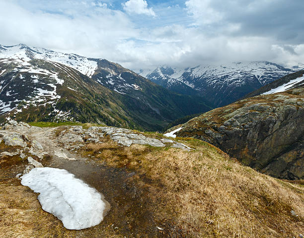 Summer mountain landscape (Grimsel Pass, Switzerland) Summer mountain landscape with snow on top (Grimsel Pass, Switzerland) grimsel pass photos stock pictures, royalty-free photos & images