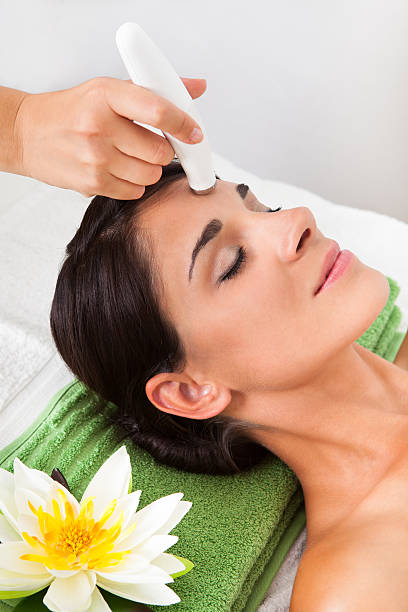 istock Woman Getting A Face Treatment 465388991