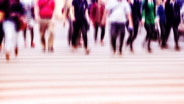 istock People walking on big city street 465389182