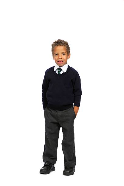 istock Young Biracial Boy In School Uniform 465389701