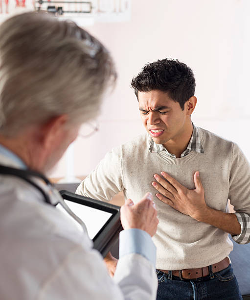 istock Describing symptoms to a doctor 465390483