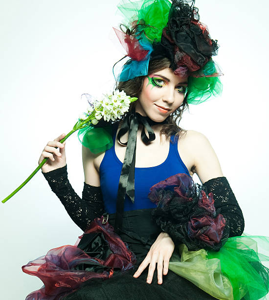 istock Young model in carnaval dress with creative make-up. 465390688