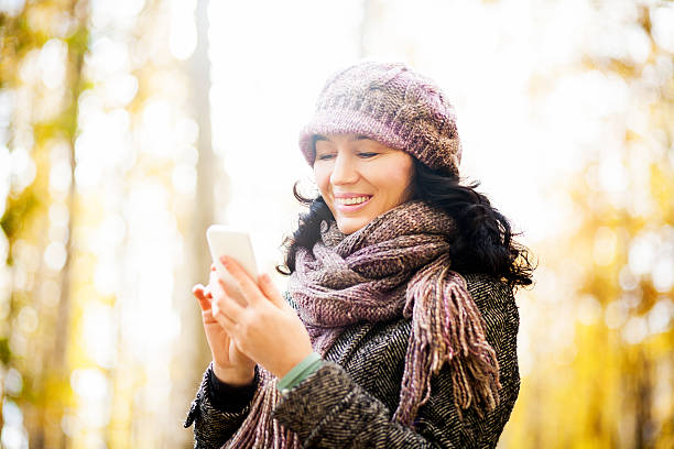 istock Woman uses a smartphone 465391015