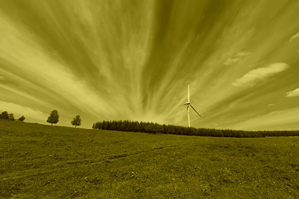 istock wind power generator on the grassland 465393824