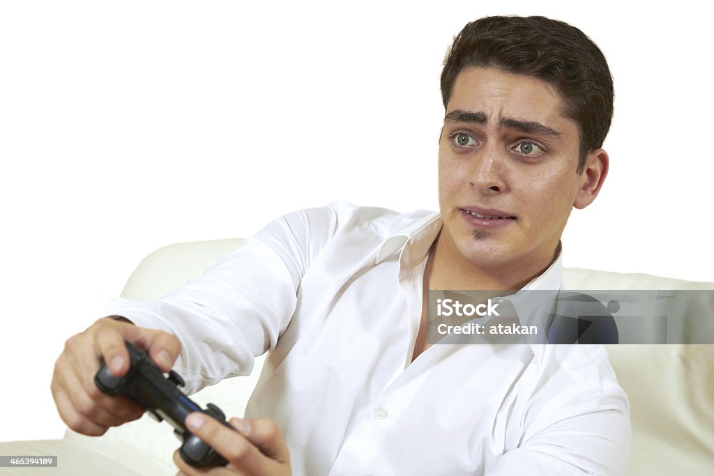 Playing video games 25-29 Years Stock Photo