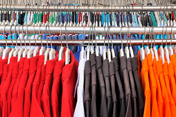 istock Colorful t-shirts on hangers 465396678