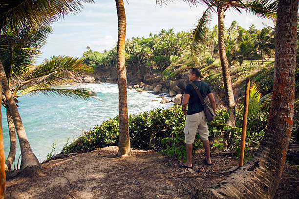 istock Man staring at the paradise 465397631