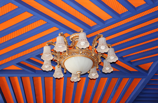 Chandelier with the blue and orange beams in Tibet, China