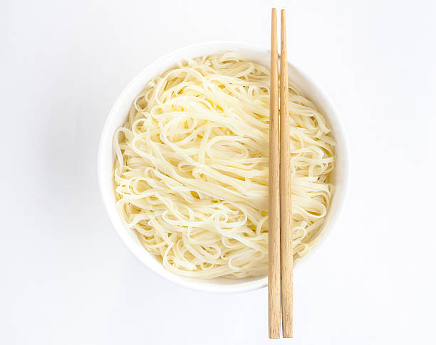 istock Egg noodle in a white bowl isolated on white 465404054