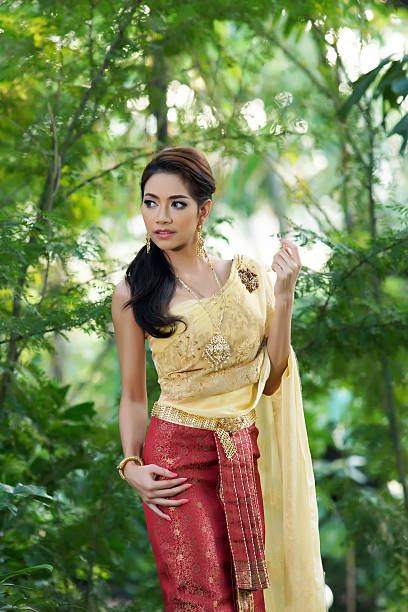 istock Thai woman wearing typical dress 465404087