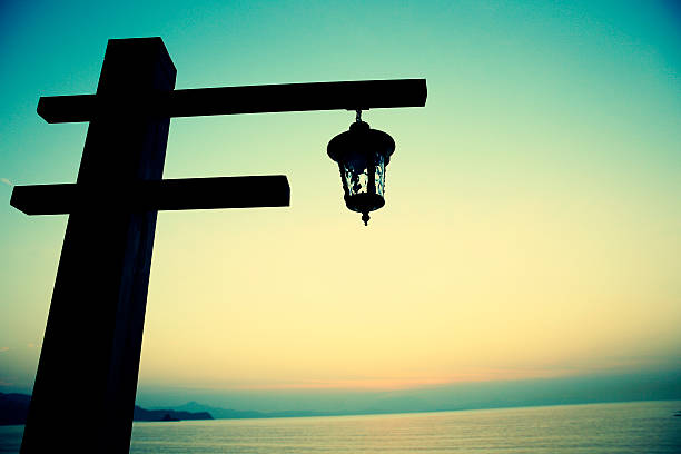 vintage lantern hang on seaside wooden post