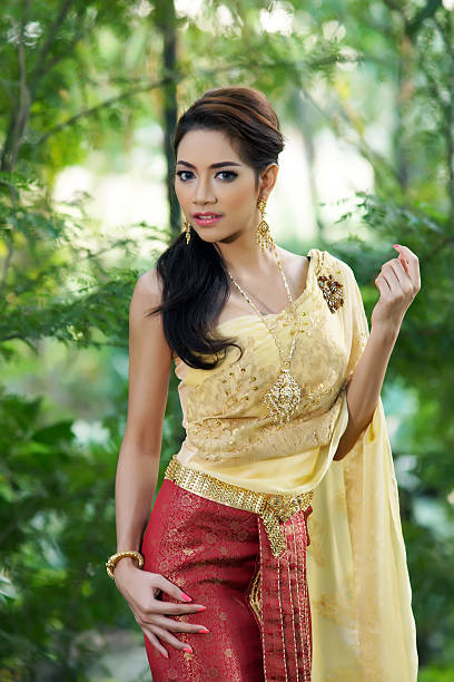 istock Thai woman wearing typical dress 465405223