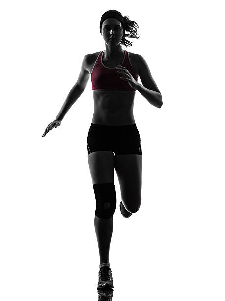 istock woman runner running marathon silhouette 465406013