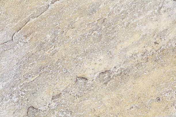istock texture and seamless background of white granite block stone 465407846