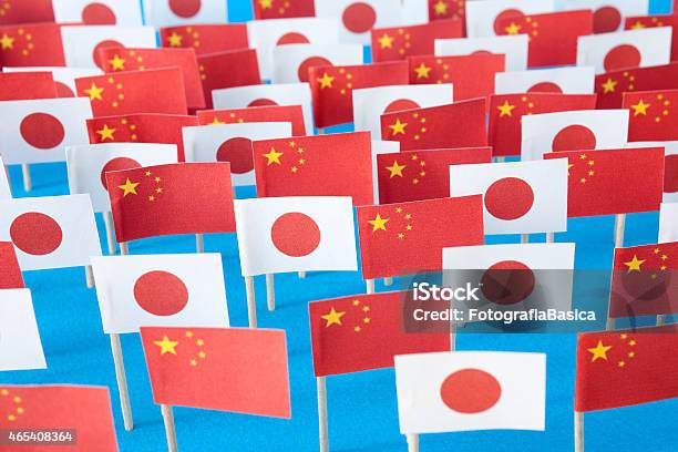 Chinese And Japanese Flags Stock Photo - Download Image Now - 2015, Abundance, Art And Craft