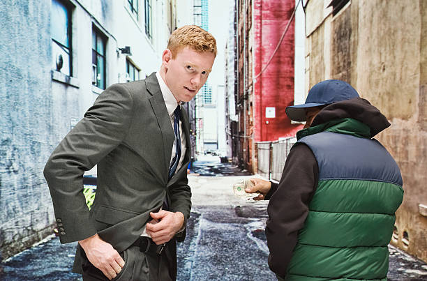 istock Customer buys from drug dealer 465411238