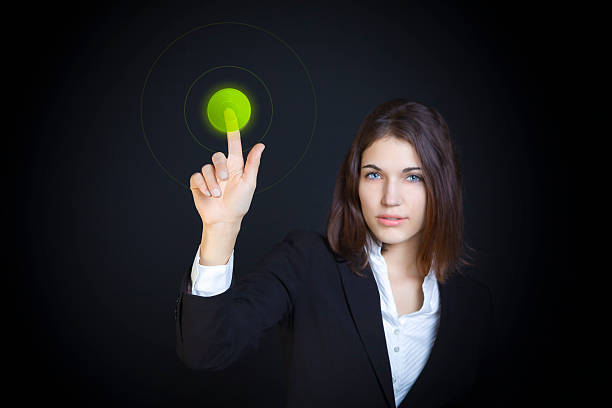 Pressing the green button stock photo