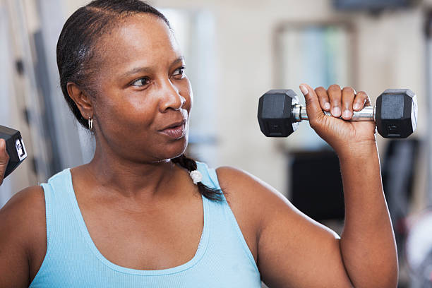 istock Mature woman at the gym 465413093