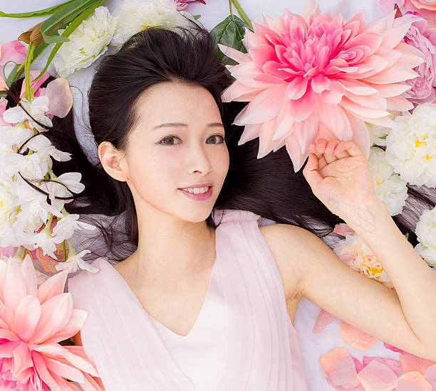 istock girl in flowers sleeping spa 465413162
