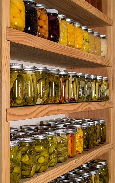 istock Storage shelves with canned food 465413248