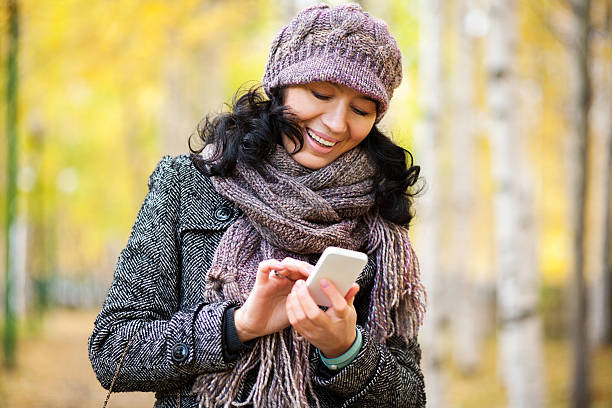istock Woman uses a smartphone 465413821